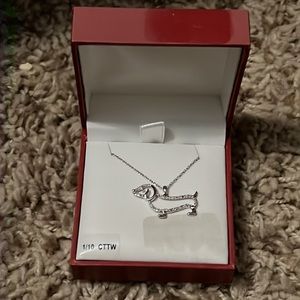 10k white gold 1/10 cttw dachshund pendant. Brand new with tags.